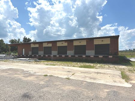 6.68 acres of Industrial Outdoor Storage (IOS) w/ Warehouse