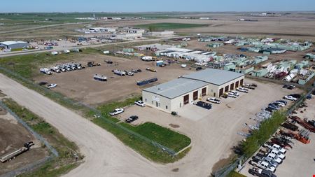 ±14,000 SF Industrial Shop | ±6.63 Fenced Yard | Williston ND