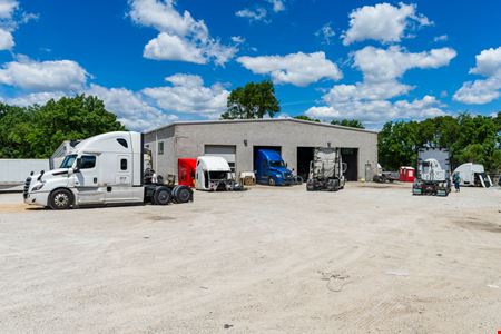 Industrial Facility with Office Space & Fleet Storage & 11.8± AC Dev. Site