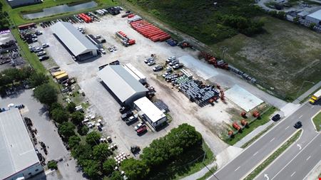 4.62 AC of Fully Fenced Industrial Land with Covered Storage