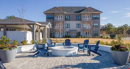 100% of the Limited Liability Company Membership Interests in the Entities that Own the Ansley Park, NC Apartment Complex