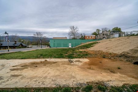 INVESTMENT OPPORTUNITY | OCCUPIED MIXED-USE BUILDINGS + 0.51 ACRES