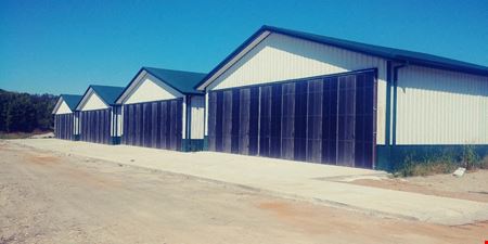 Unassigned space for Sale at Great Investment! 8 Airplane Hangers Ready to be Leased Up in McKinney