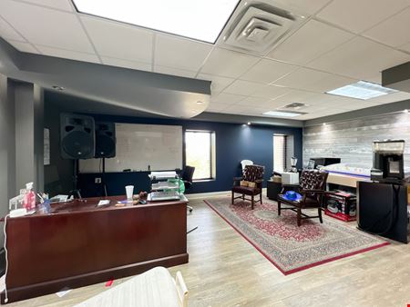 Office Warehouse w/ Rental Income Bordering Airport