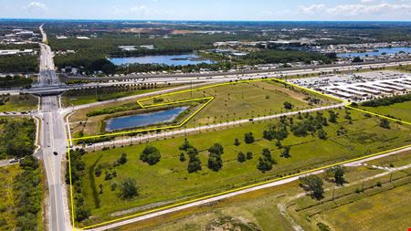 VacantLand space for Sale at 22+- Acres Commercial S/W Corner I-95 and Eau Gallie Blvd Space Coast Florida in Melbourne