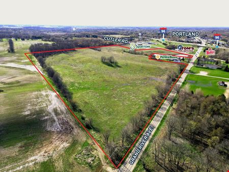 Land space for Sale at I-96 Interchange Site in Portland, MI (1800 E. Grand River) in Portland