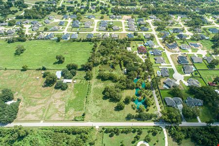 Versatile Commercial & Residential Opportunity with Two Homes and Warehouse