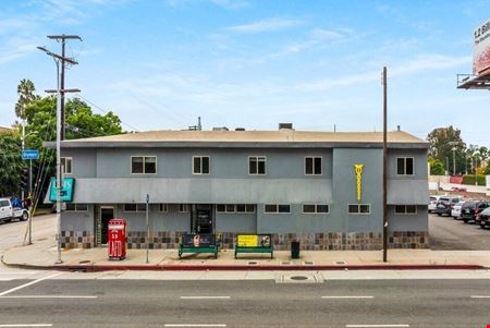 11543-11545 Olympic Blvd. / 2146 S. Colby Ave.