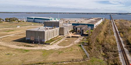 PRICED BELOW DIRT VALUE! 22 WF Acres 173K SF Bldg 20+ MW of Power Avail.