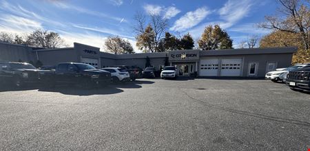 Auto Body Repair Business with Real Estate For Sale