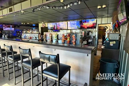 High-Visibility Freestanding Bar Property