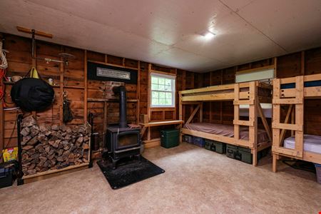 ADJOINING NATIONAL FOREST - 54.5 ACRE OFF-GRID MOUNTAIN RETREAT W/ CABIN