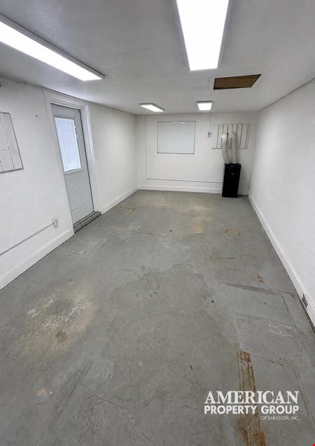 Freestanding Commercial Building with Fenced Land in Downtown Englewood