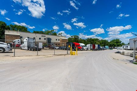 Industrial Facility with Office Space & Fleet Storage & 11.8± AC Dev. Site