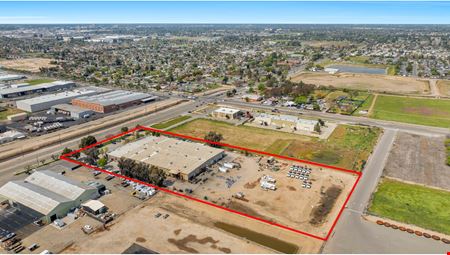 Freestanding Heavy Industrial Building w/ Office/Showroom on ±5 AC