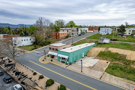 INVESTMENT OPPORTUNITY | OCCUPIED MIXED-USE BUILDINGS + 0.51 ACRES