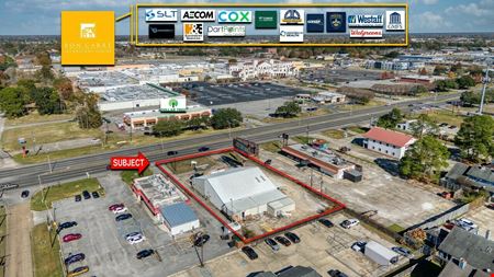 NEWLY REMODELED RETAIL STRIP CENTER WITH DRIVE-THRU