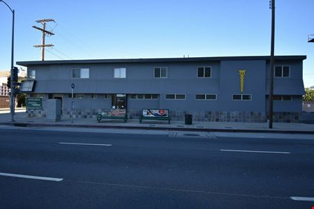 11543-11545 Olympic Blvd. / 2146 S. Colby Ave.
