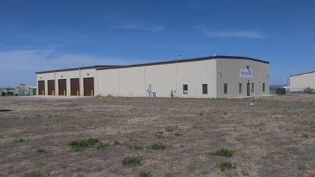 ±14,000 SF Industrial Shop | ±6.63 Fenced Yard | Williston ND