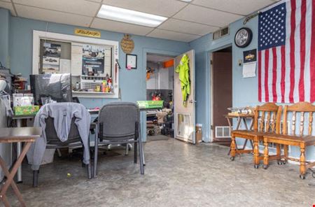 Retail space for Sale at Turnkey Car Dealership & Shop - Excellent Corner Location in Lansing