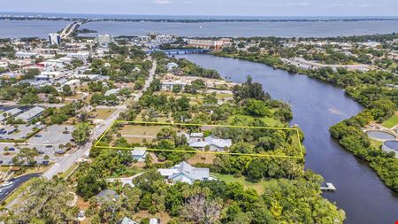 THE 1.04 ACRES OF MULTI-FAMILY LAND IMPROVED WITH SINGLE-FAMILY HOMES