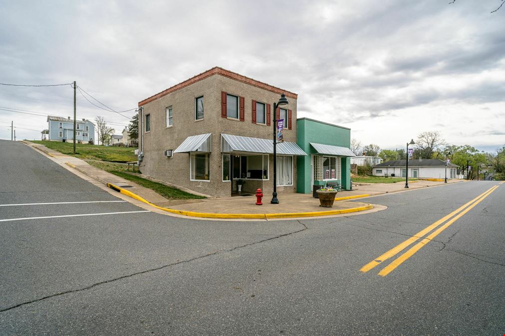 INVESTMENT OPPORTUNITY | OCCUPIED MIXED-USE BUILDINGS + 0.51 ACRES