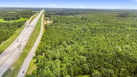 VacantLand space for Sale at Prime Interstate-Frontage Commercial Tract – ±8.8 Acres with 3 Income Producing Building in New Waverly
