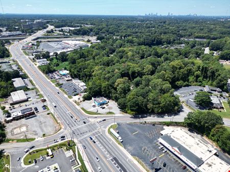 Income Producing Laundry Facility | ±4,408 SF | ±0.85 AC | Signalized Corner Development Site
