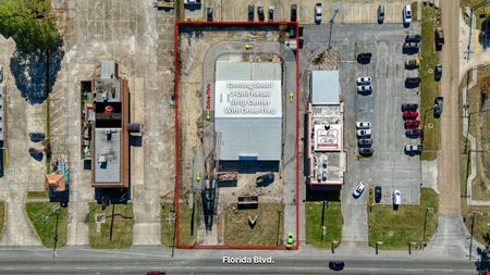 NEWLY REMODELED RETAIL STRIP CENTER WITH DRIVE-THRU