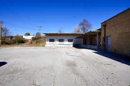 7,254 SF Warehouse / Retail Building For Sale or For Lease on Historic Commercial Street