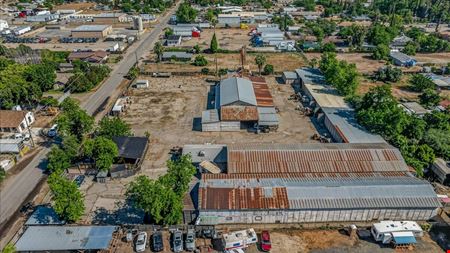 Open Industrial Buildings on 2.14 AC Fenced Land