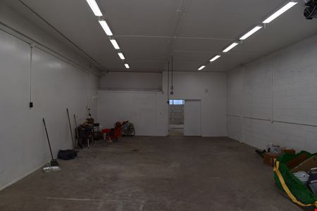 2,000 SF office warehouse unit with drive through 10'x10' doors