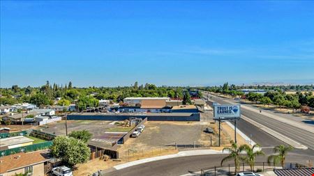 Highly Visible ±0.75 AC Clovis Ave Land + Office Building